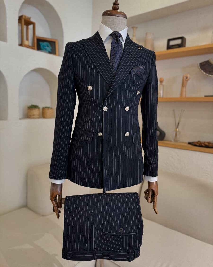 Slim fit all black double breasted two piece men's suit with peak lapels