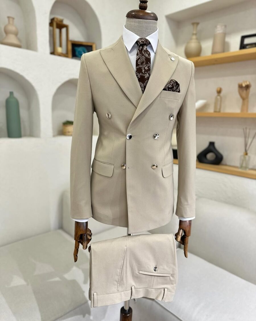 Tailored slim fit ecru double breasted men's suit with peak lapel